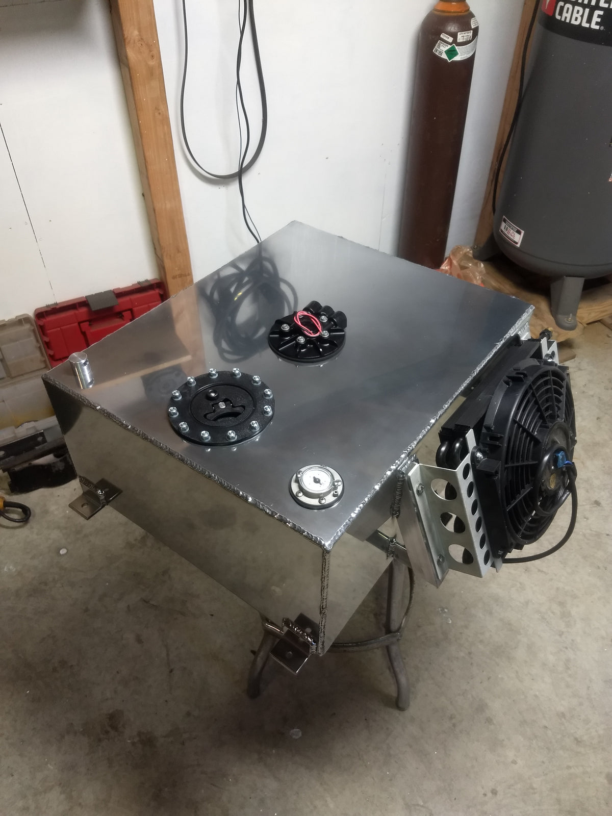 E85 Compatible bed-mounted fuel cell with integrated E85 pump and auxiliary transmission cooler